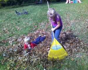 Anna working hard raking the leaves