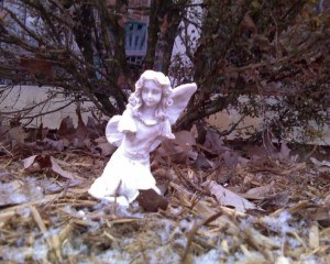 My broken angel in the winter garden