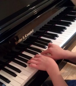 Jake playing the piano for me