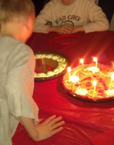 Spencer blowing out his candles