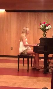 Anna playing piano