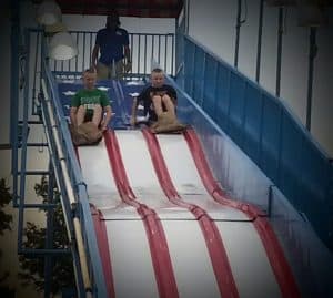 Boys on the giant slide